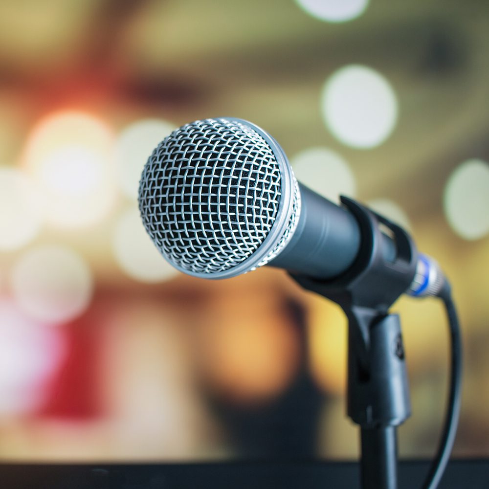 Close-up of a microphone on a stand.